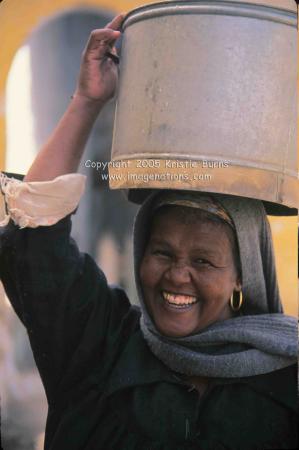 Woman Carrying Water in Aswan Egypt